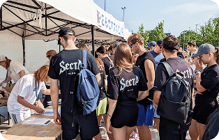 Participants receive race kits at the run location